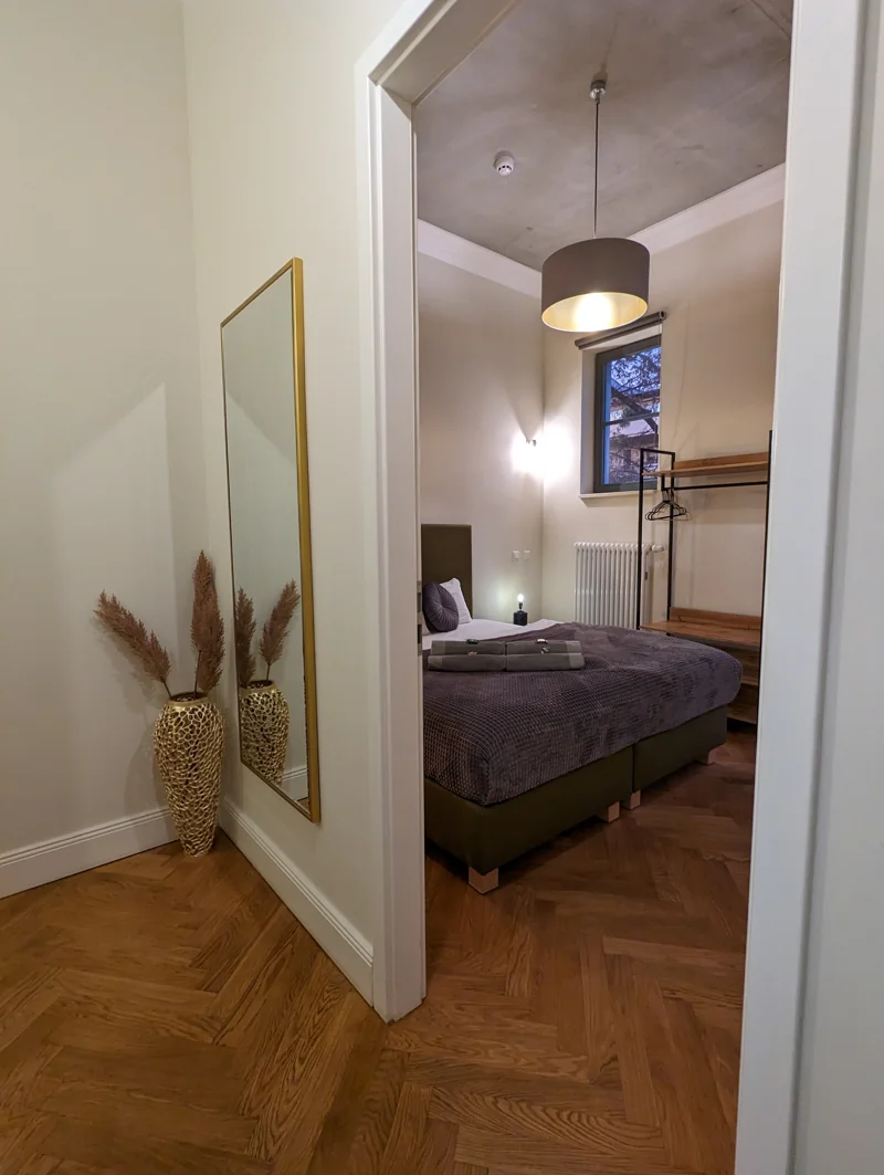 Second bedroom with a double bed and soft neutral colours